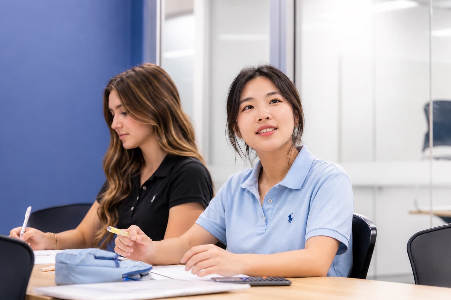 Students smiling together during a Sigma Science lesson